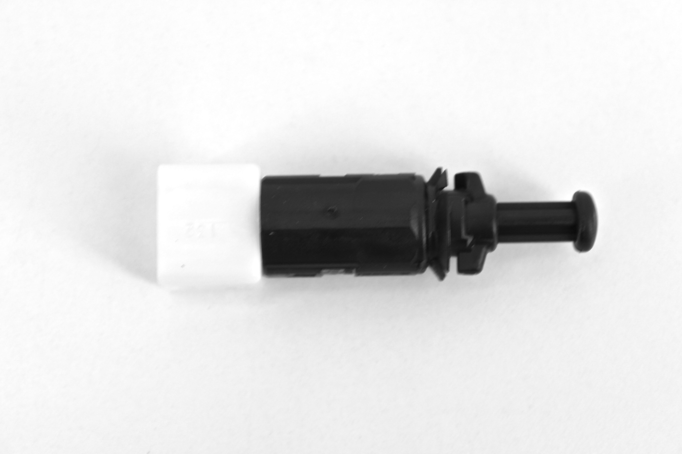 Bremselysbryter på pedal